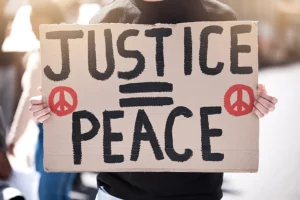 Sign reading Justice equals peace