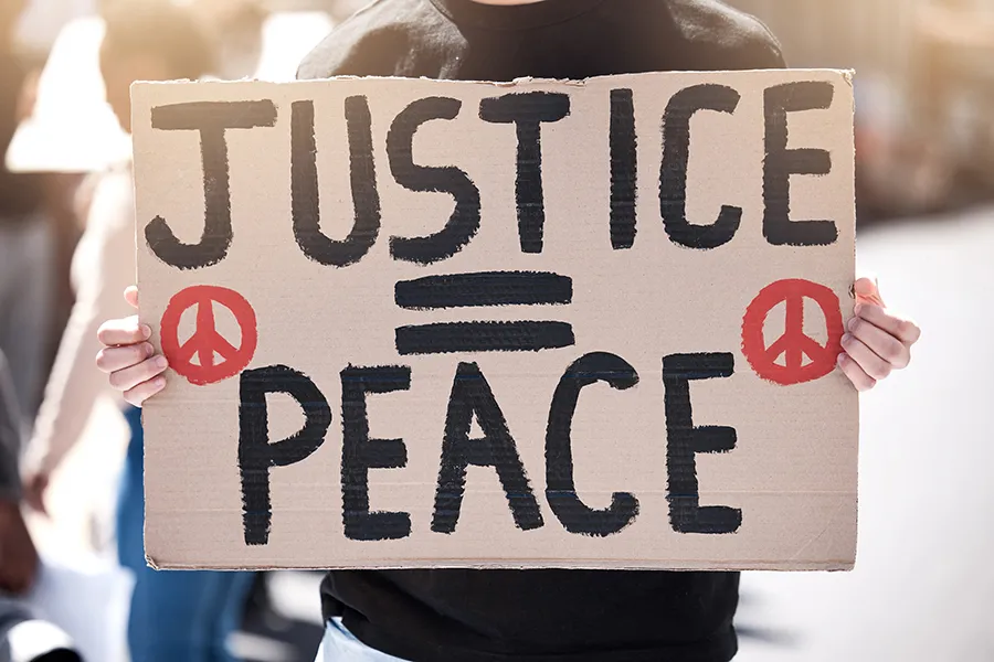 Sign reading Justice equals peace