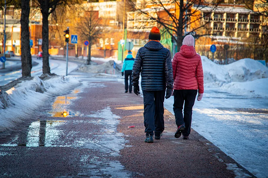 Walking on a winter sidewalk