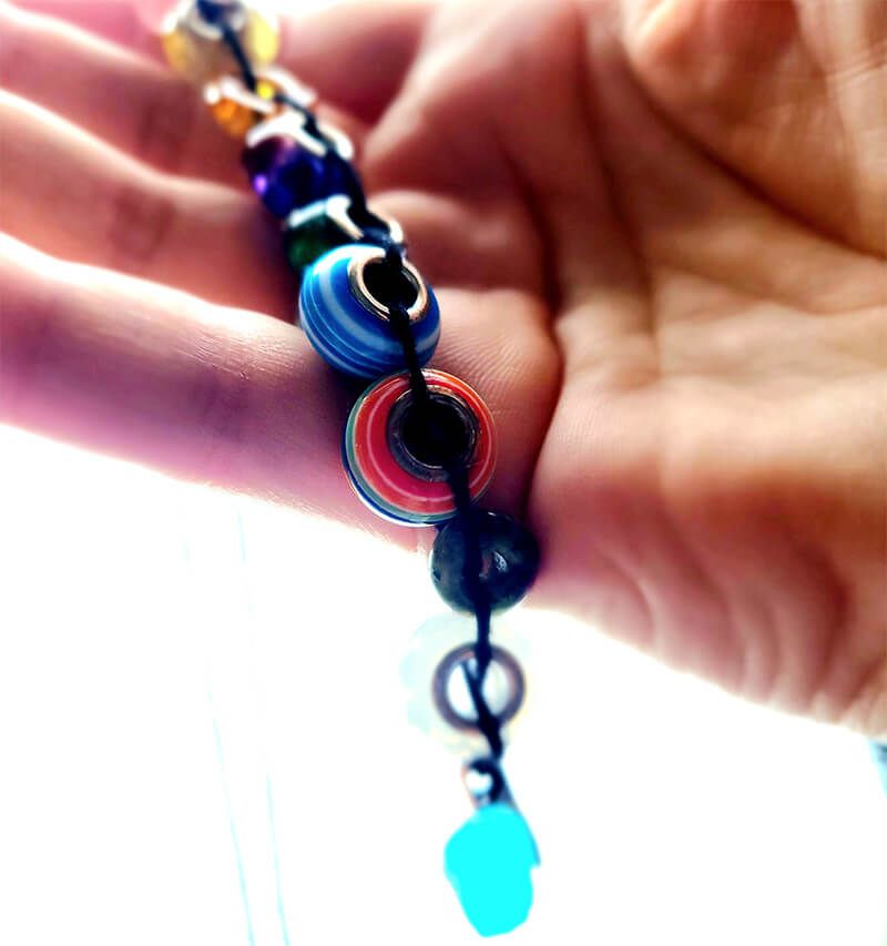 prayer beads are held in hand